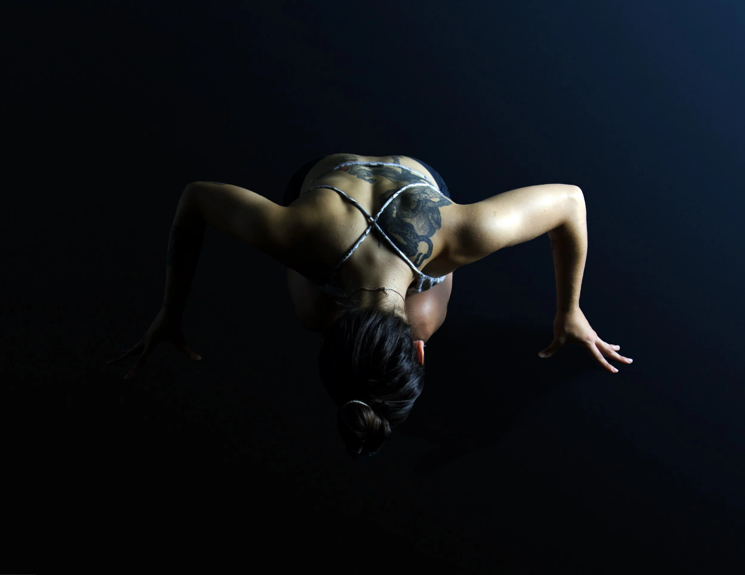 A student resting in child’s pose at RebelStudio in King’s Cross