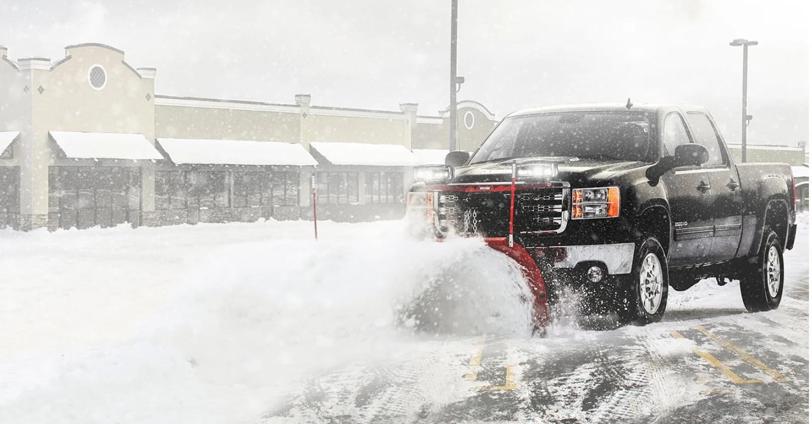 Western manufacturer photo of a pickup-mounted snowplow