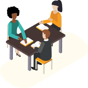 Students collaborating in small groups while a teacher circulates