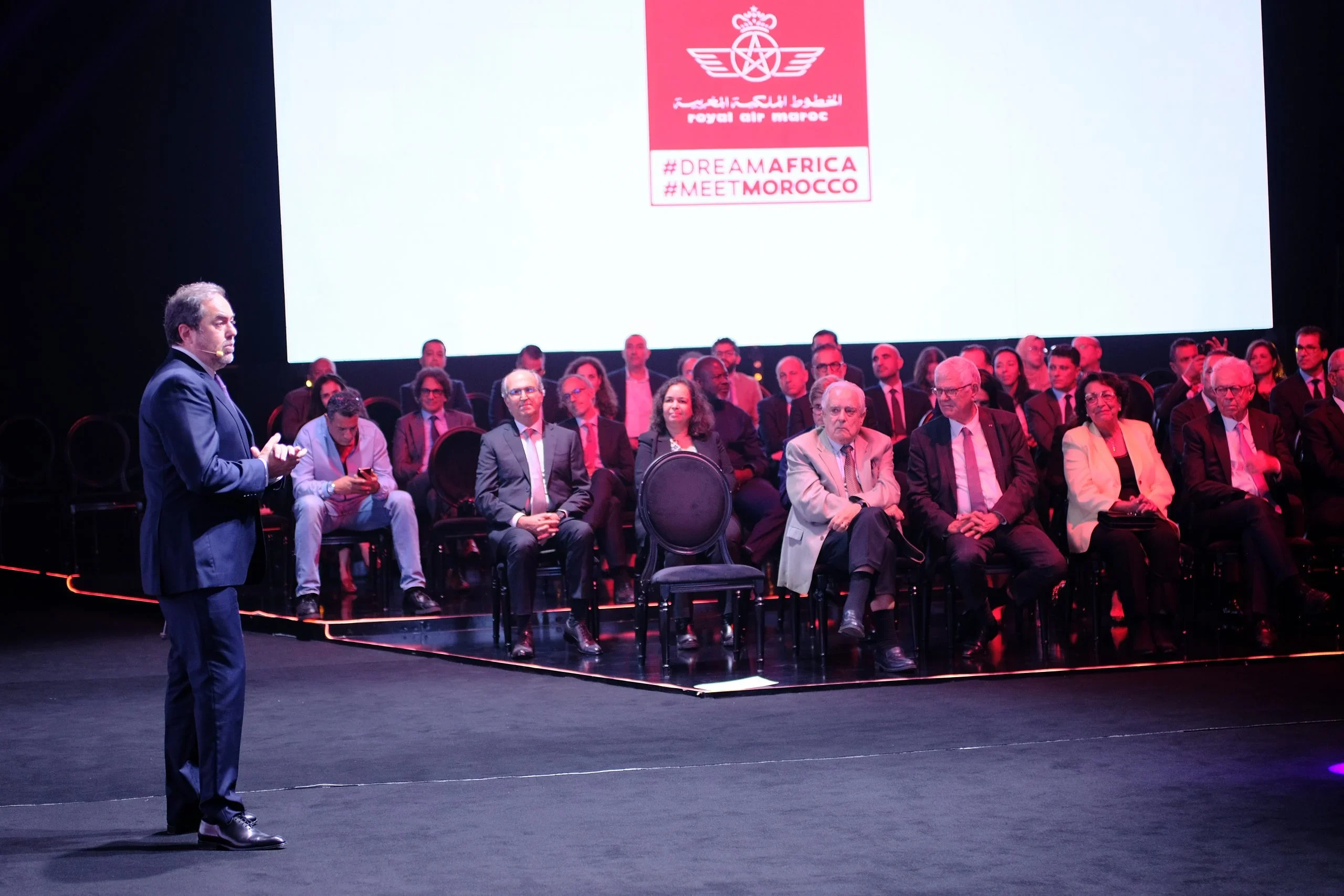 Belli presenting at a Royal Air Maroc event