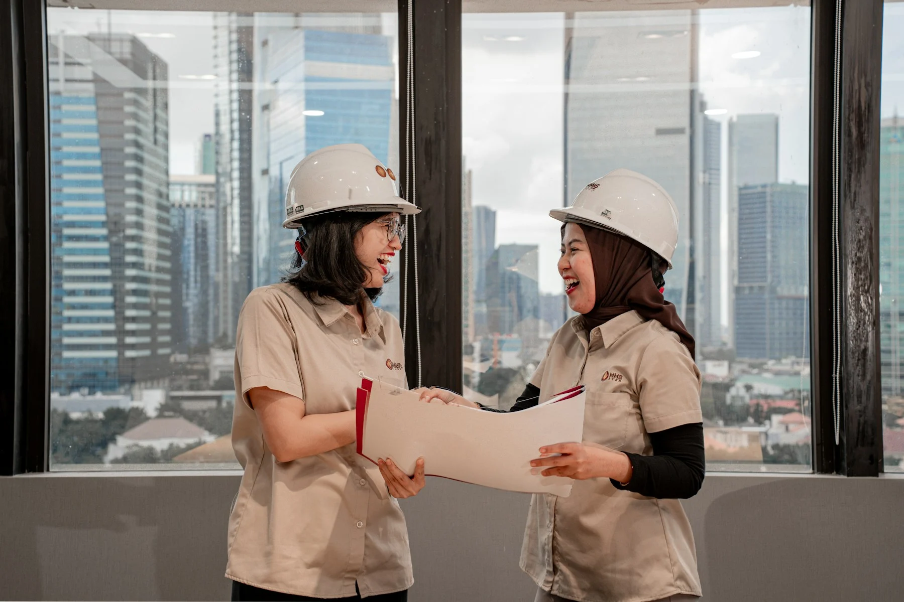 Civil engineers reviewing development plans together
