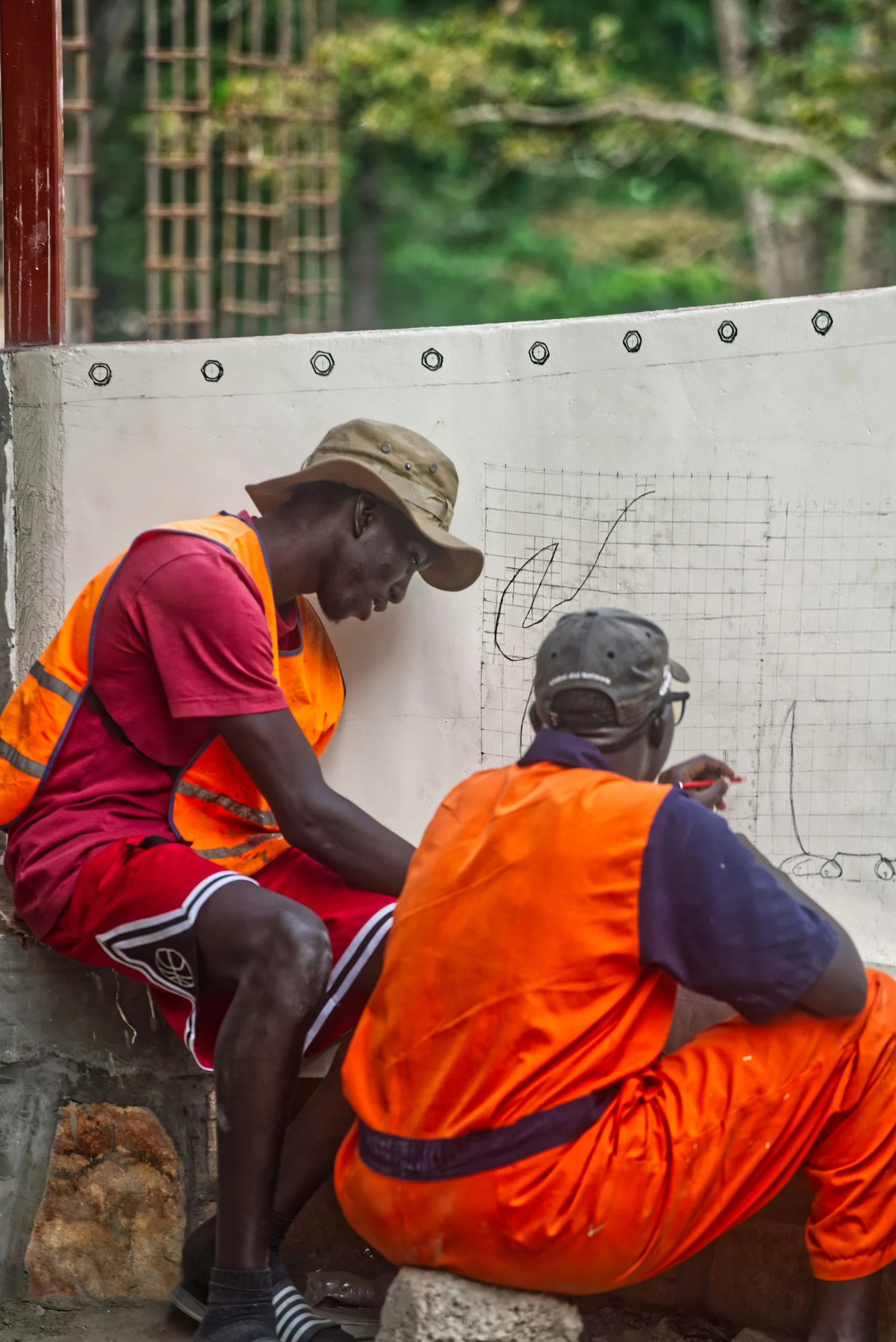 Engineering professionals reviewing technical project requirements