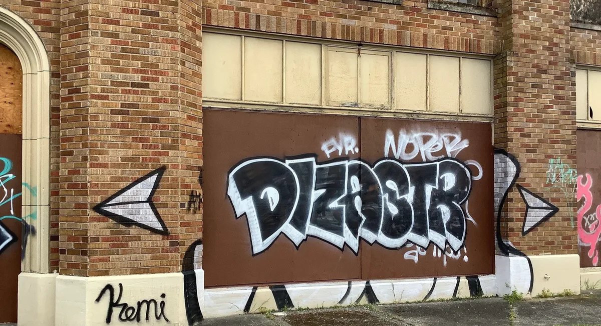 Painted panels before graffiti removal