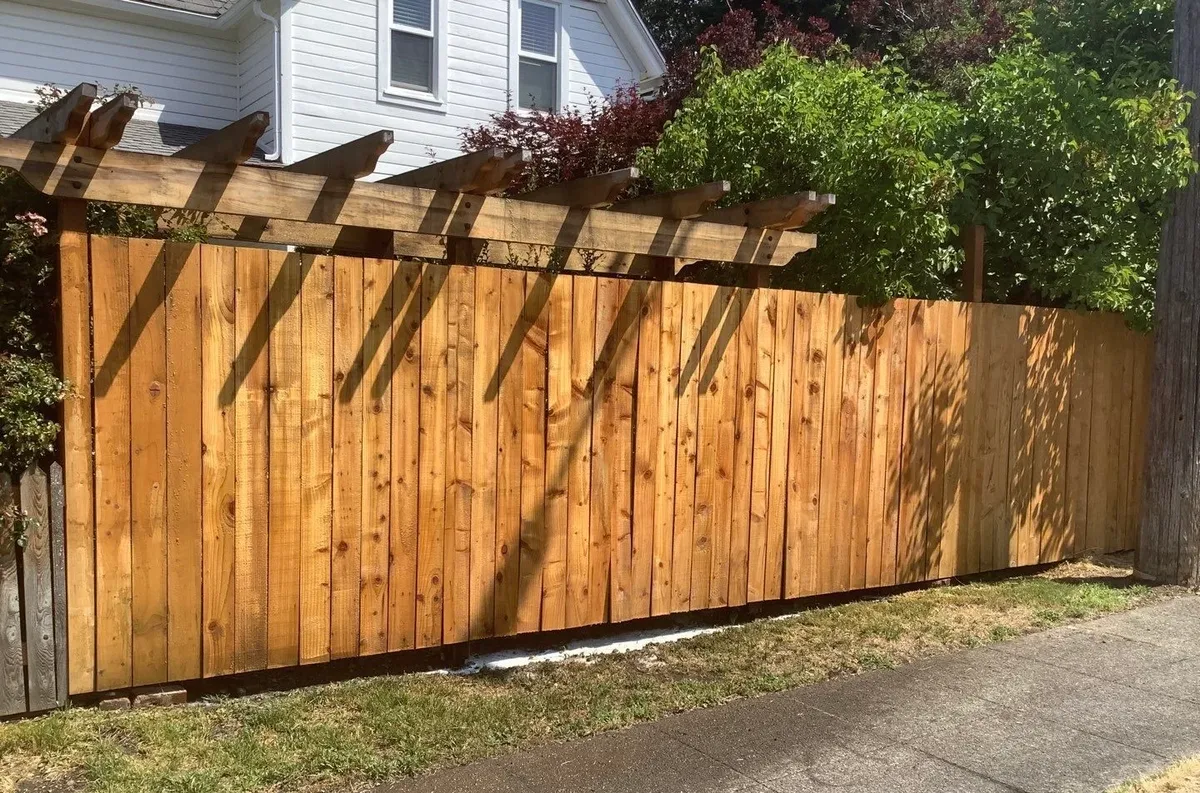 Wood fence after graffiti removal