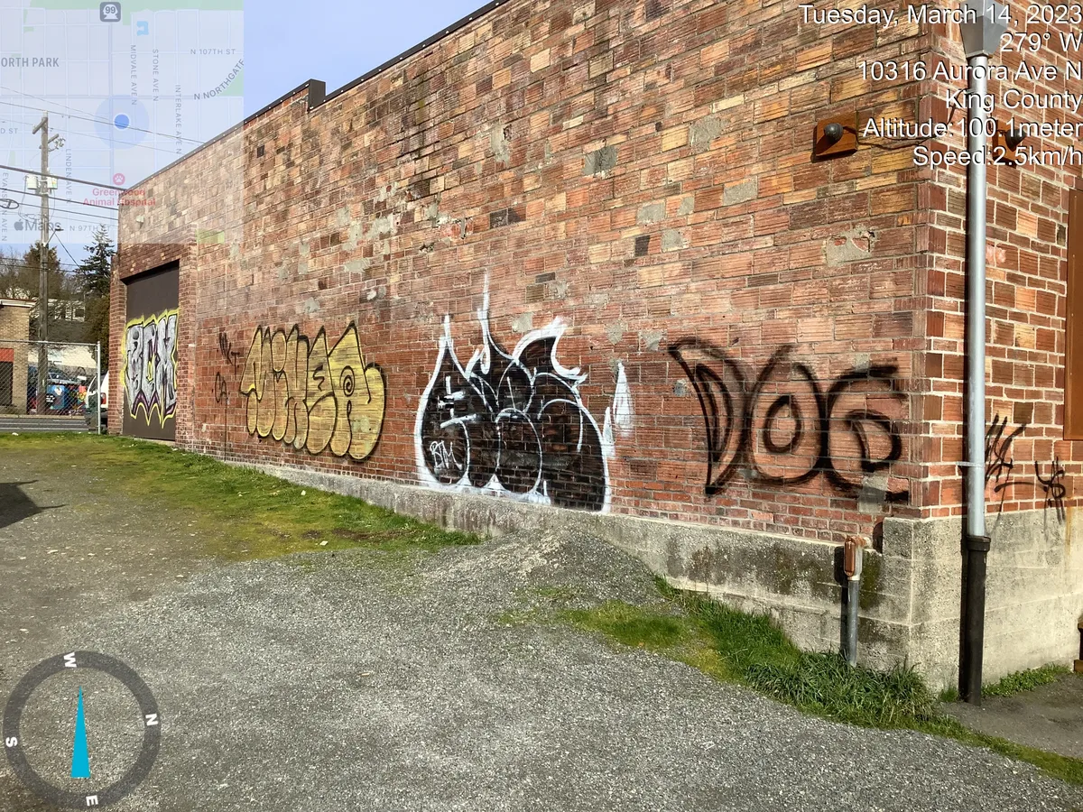 Brick wall before graffiti removal