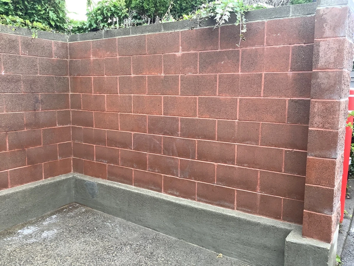 Brick retaining wall after graffiti removal