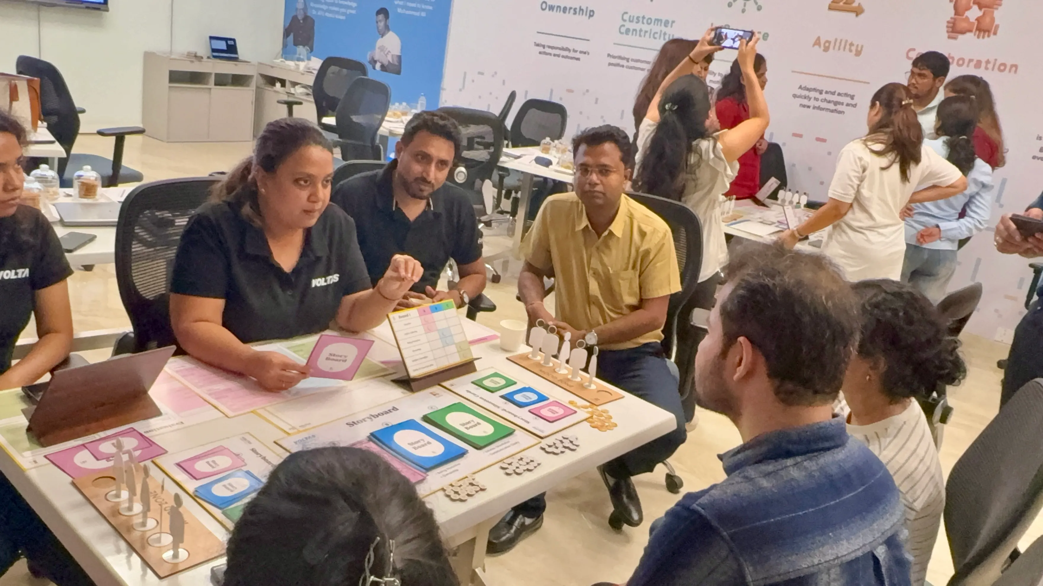 Participants practising behavioural skills through a collaborative simulation