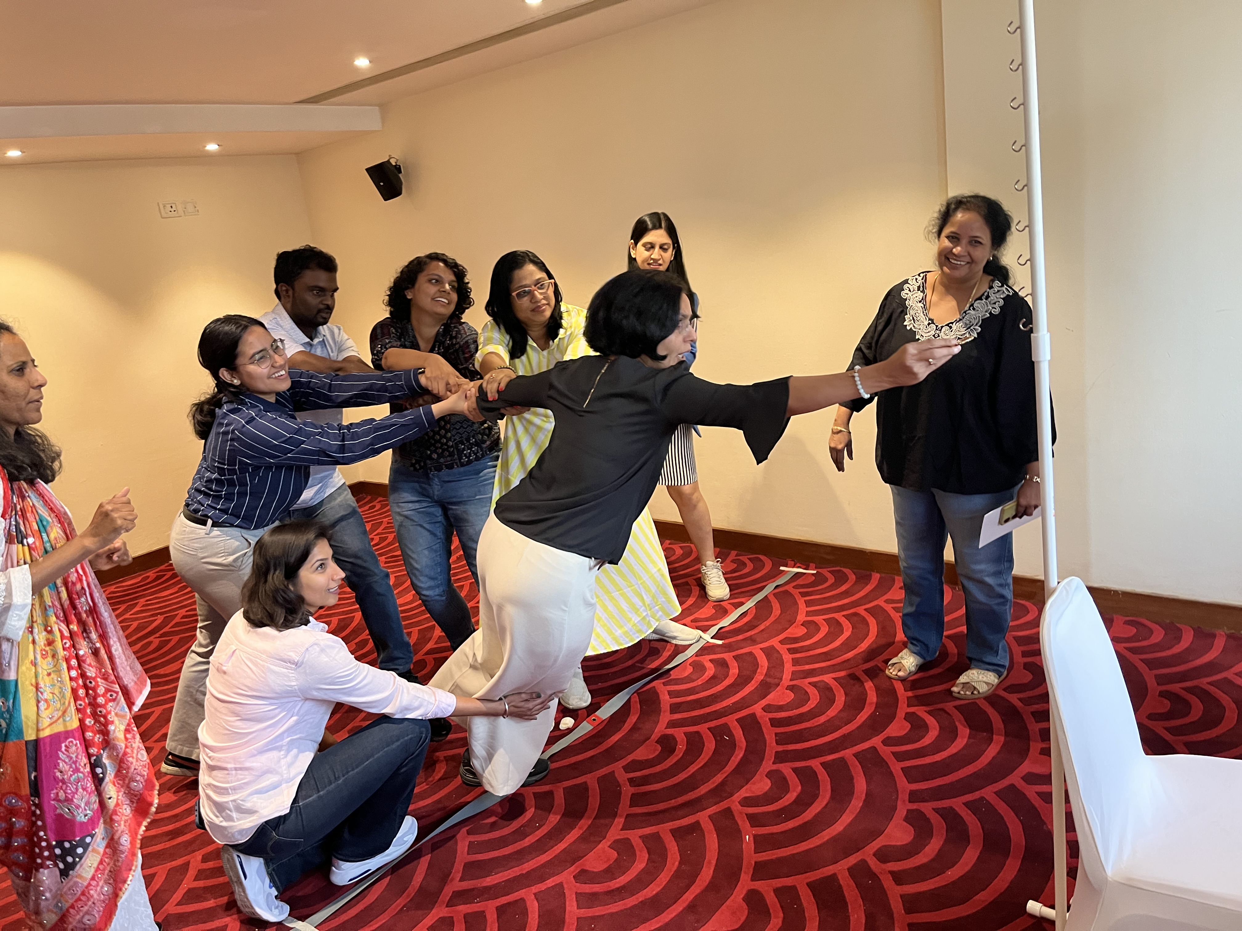 Colleagues participating in a collaborative TGIF activity