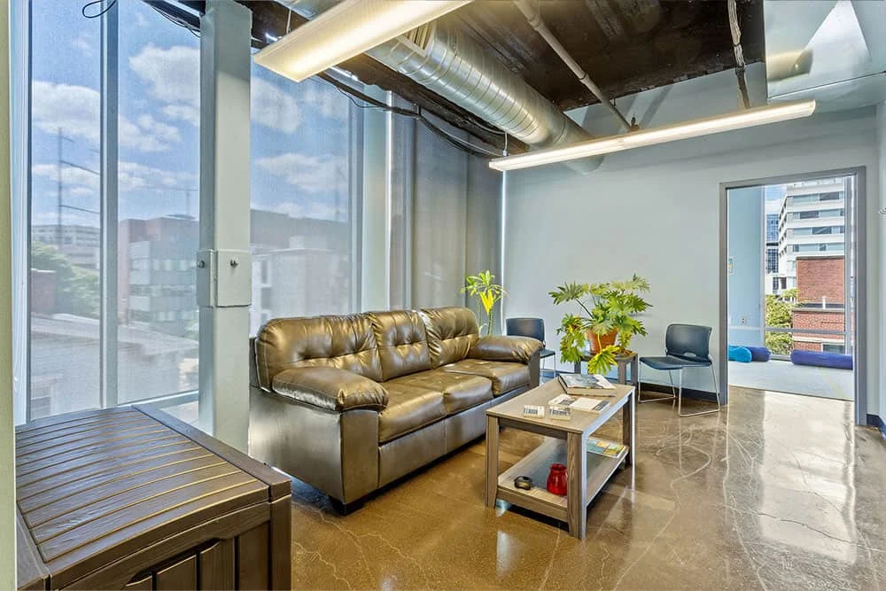 A shared lounge at the Bayard location