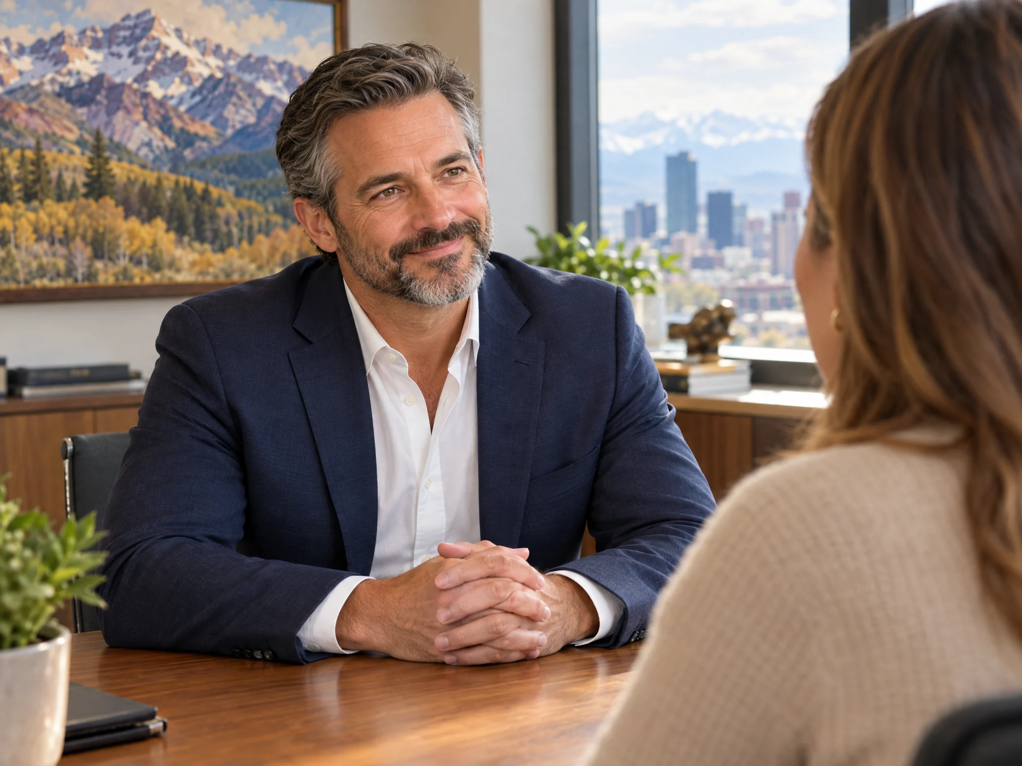 Kessler Injury Law attorney listening to a client at a table