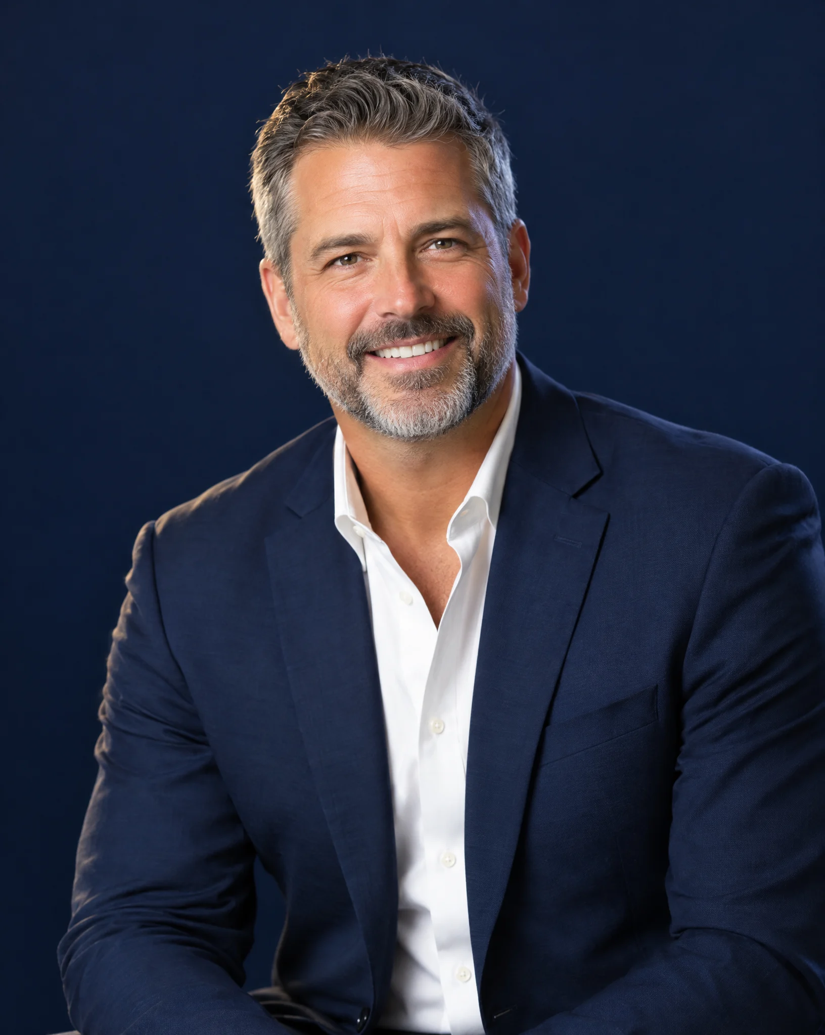 Kessler Injury Law attorney smiling in a navy suit