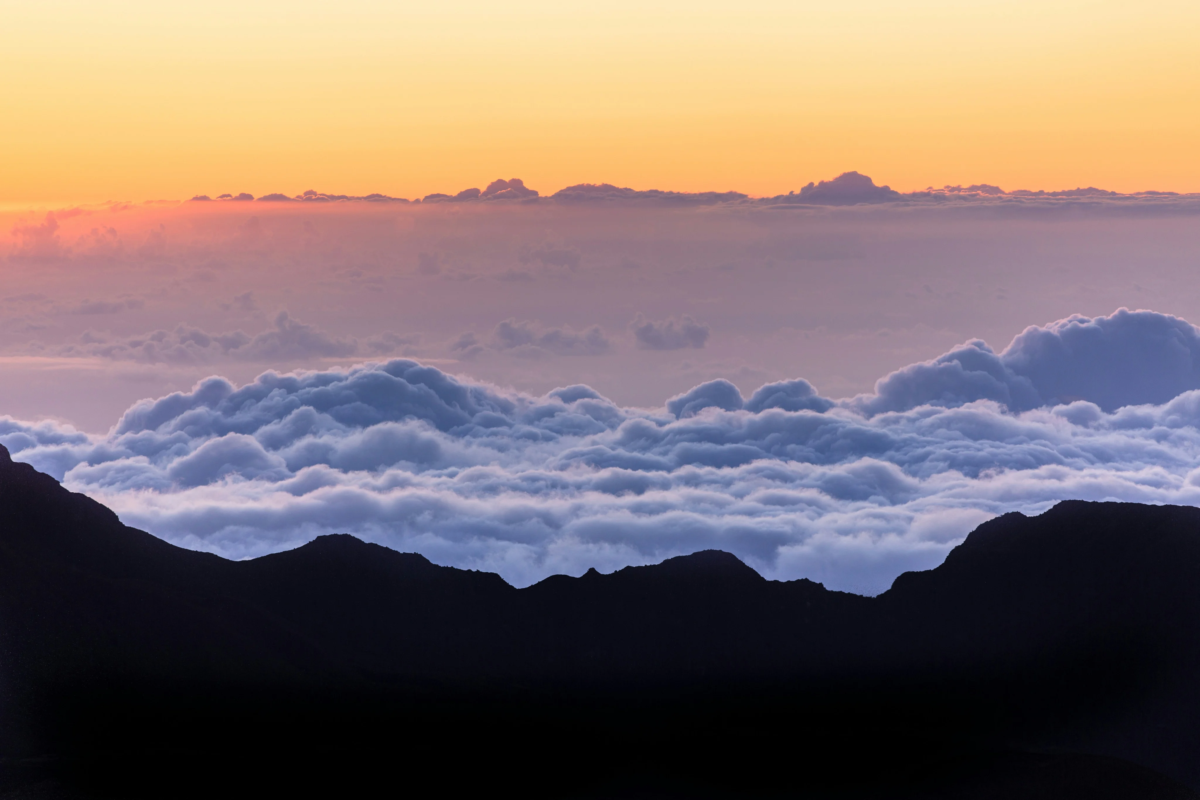 Sunset above the clouds at Haleakalā on Maui
