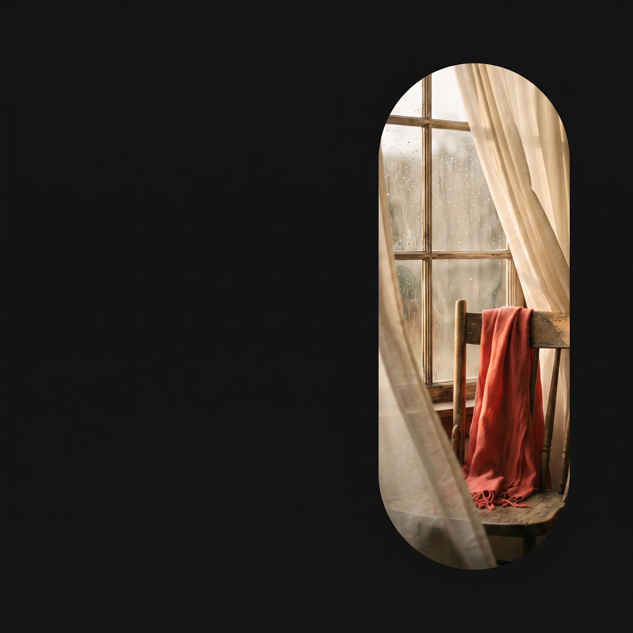 A rainlit window, cream curtain, and coral scarf framed inside one tall capsule