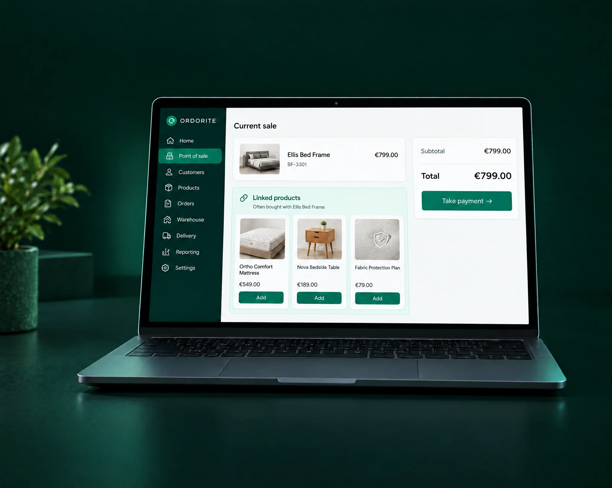 OrdoritePOS on a laptop suggesting linked products for a bed frame in the current sale