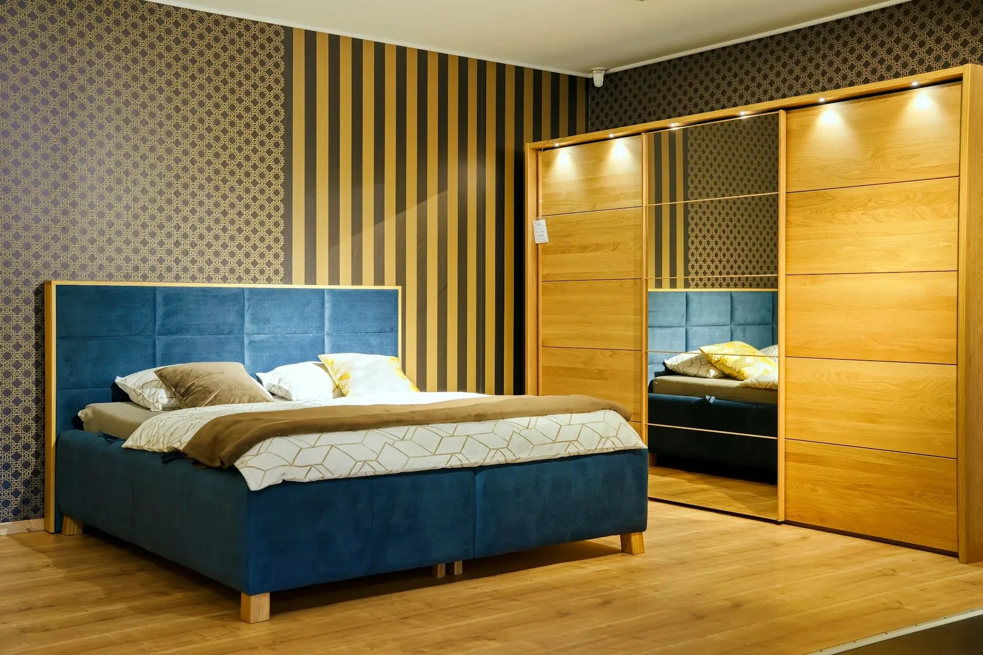 A bed and wardrobe display in a bedding store