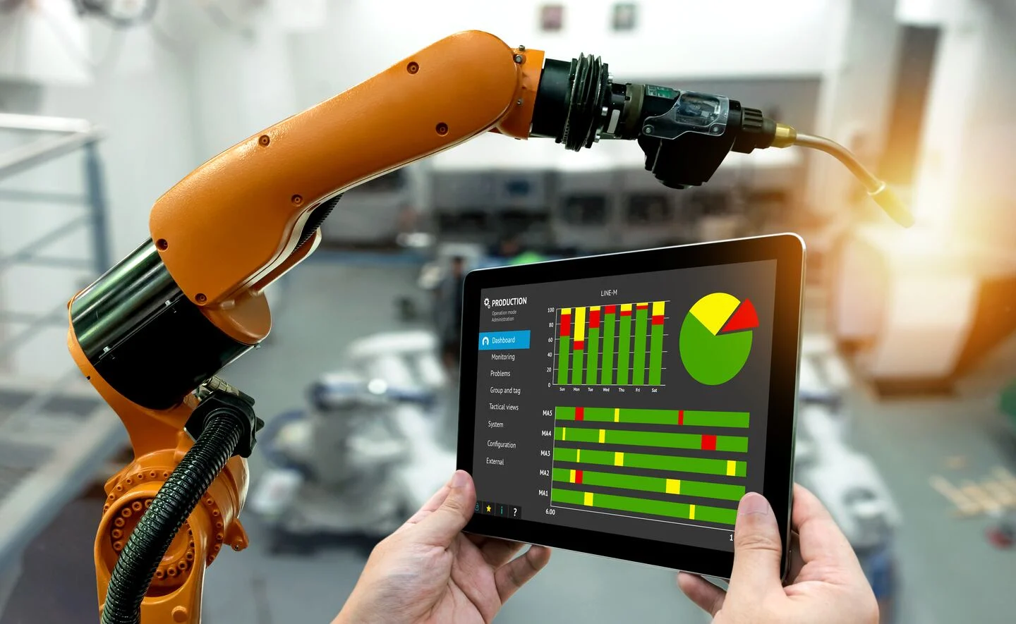 Brazo robótico y panel de control industrial en una imagen publicada por La Nación