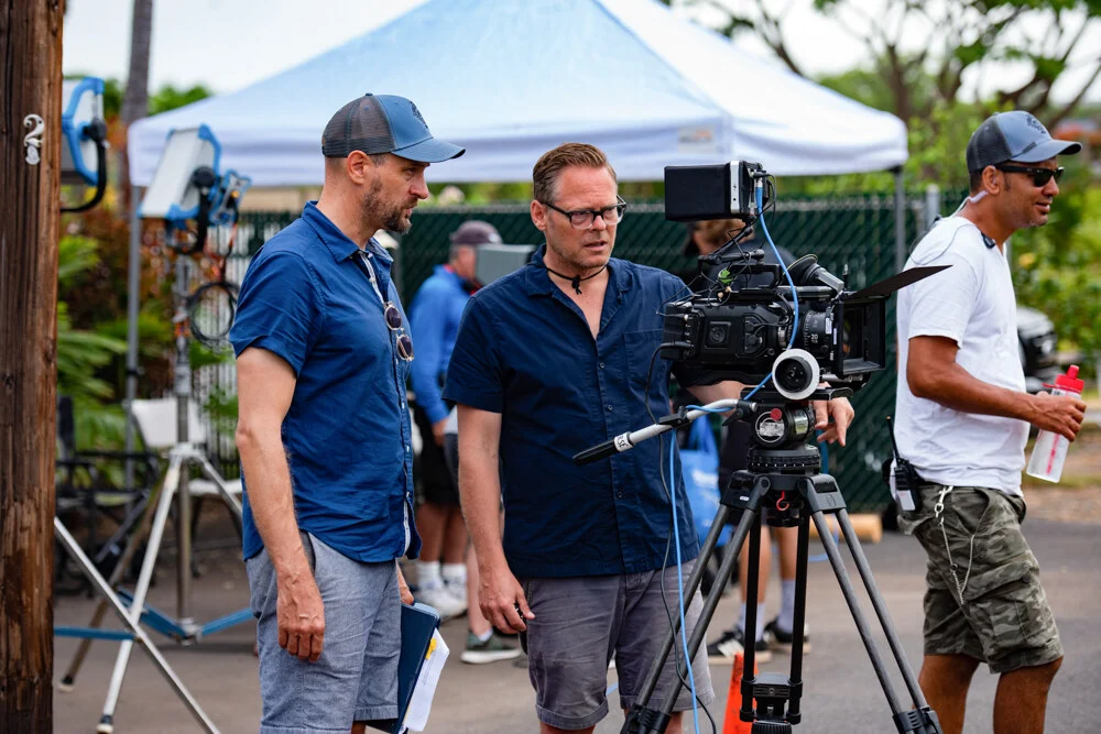 The film crew with a cinema camera on location in Maui