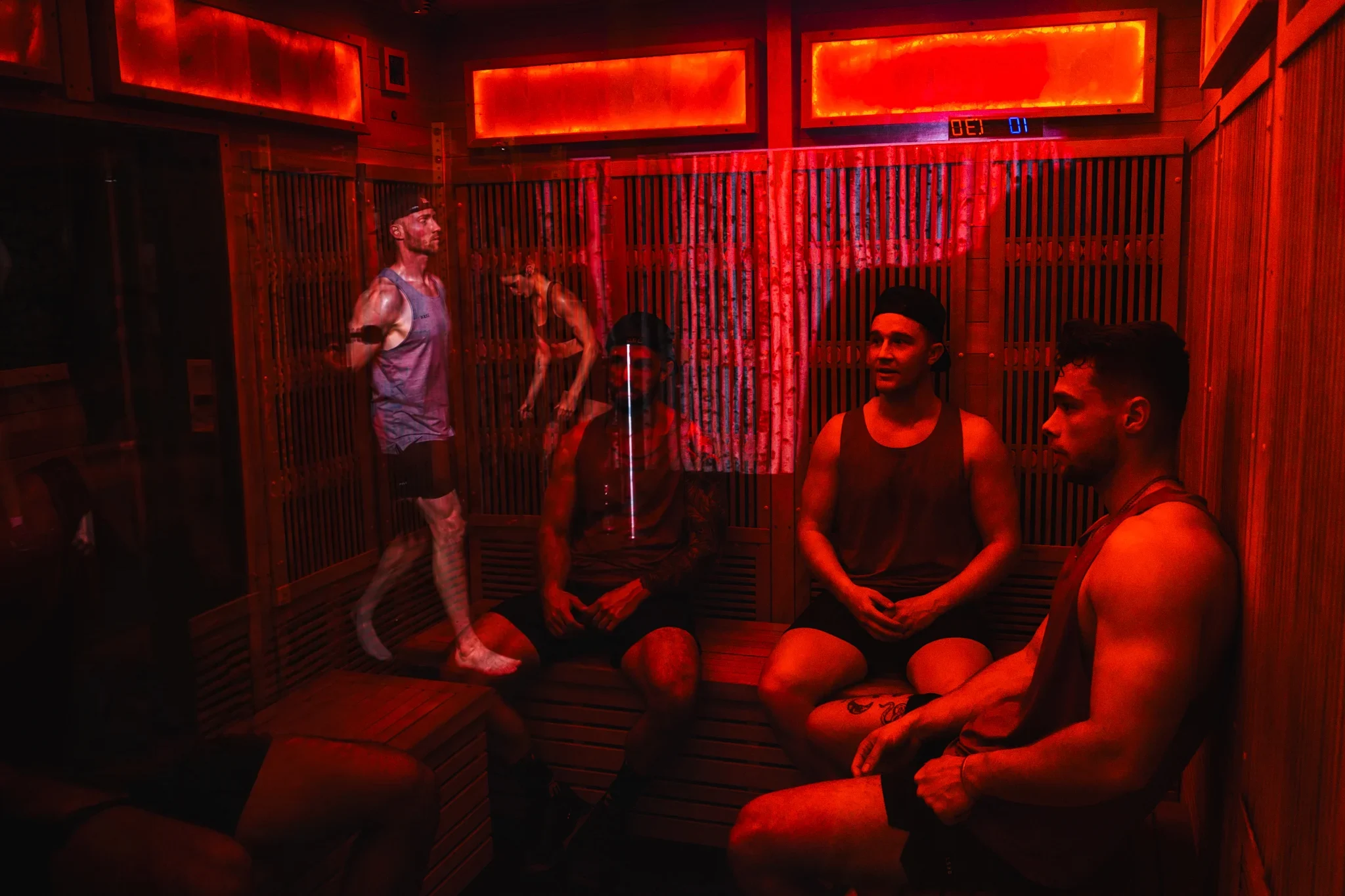 Sauna Strong members sharing an infrared sauna session